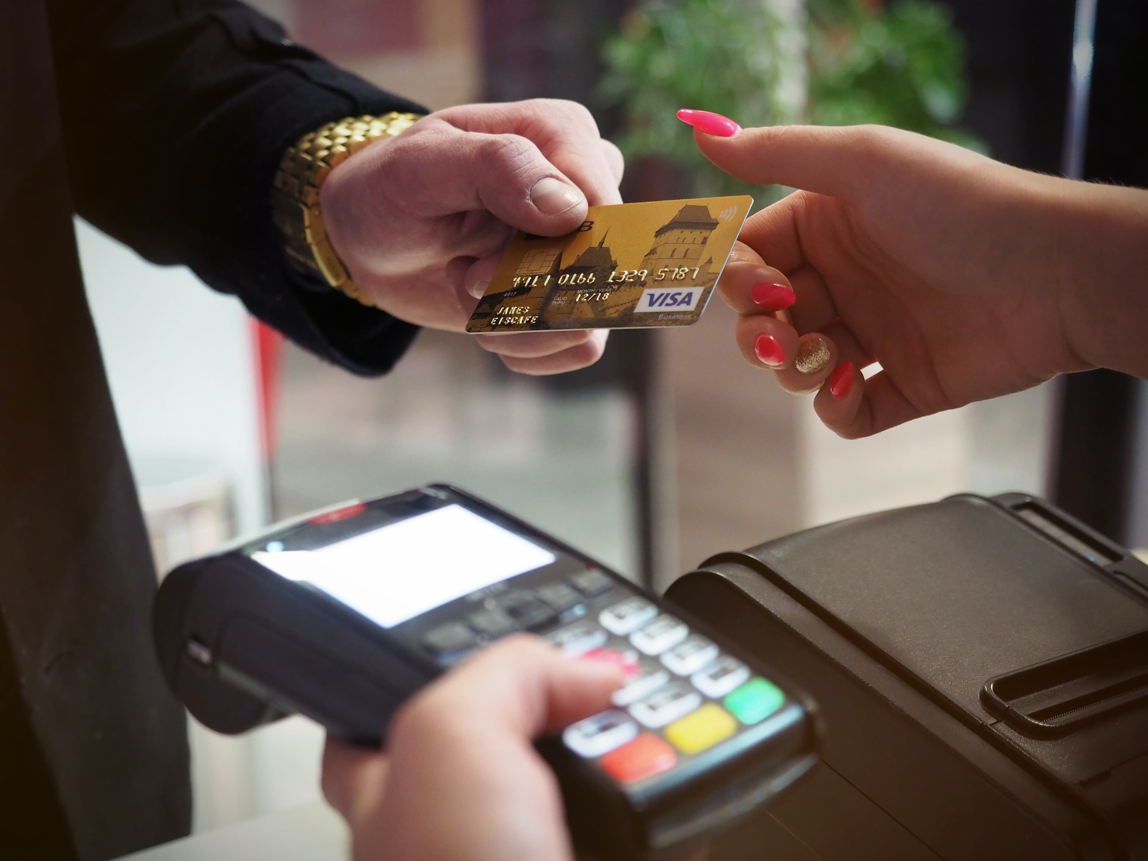 paying with a card at a store